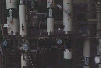 Industrial piping system with pressure gauges and control valves