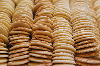 Rows of assorted white chocolate cookies and biscuits