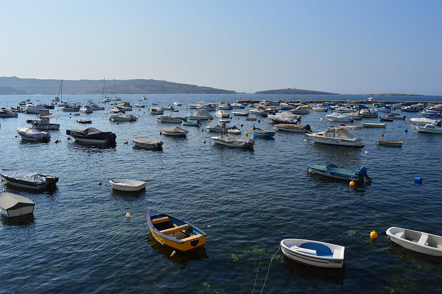 Boats Anchored in Calm Blue Harbor Waters