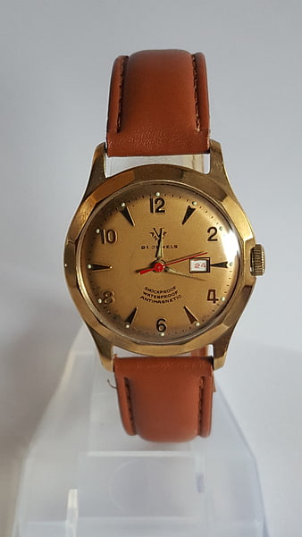 Vintage Gold Watch with Brown Leather Strap on White Background
