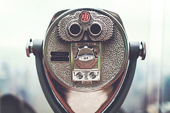 Close-up of vintage coin-operated tourist binoculars