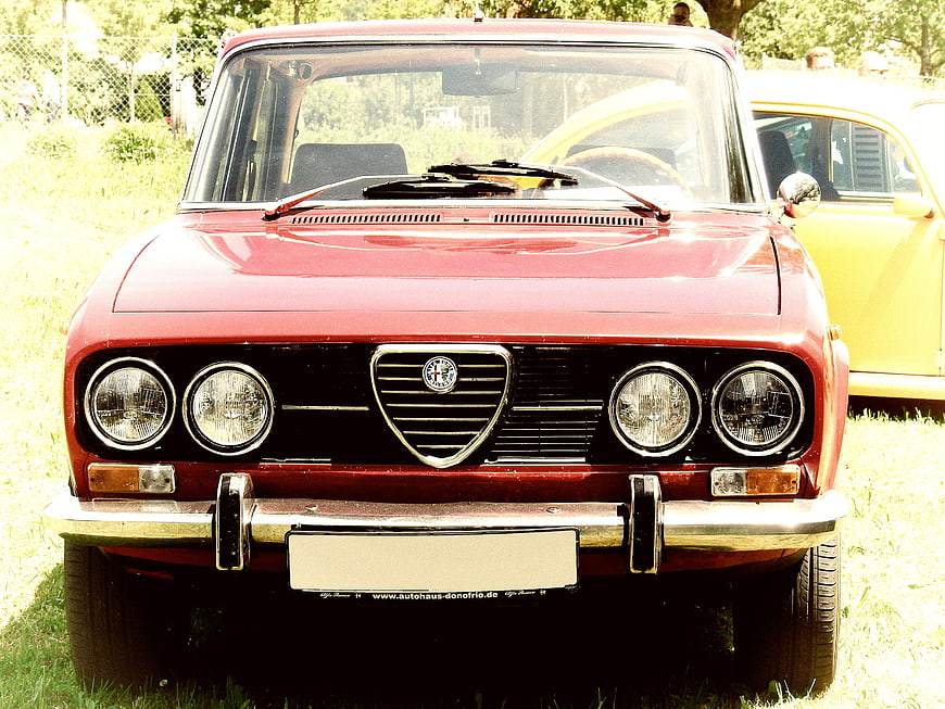 Front view of classic red Alfa Romeo Giulia vintage car