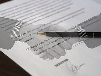 Double Exposure Handshake Over Signed Business Contract