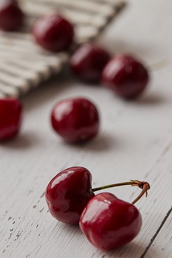 Fresh Red Cherries on White Wooden Table