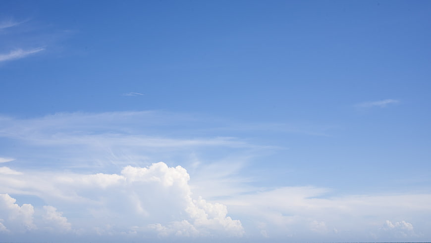 Blue Sky with White Clouds Background