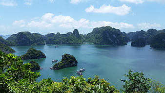 Halong Bay Vietnam Landscape With Limestone Karsts And Tour Boats