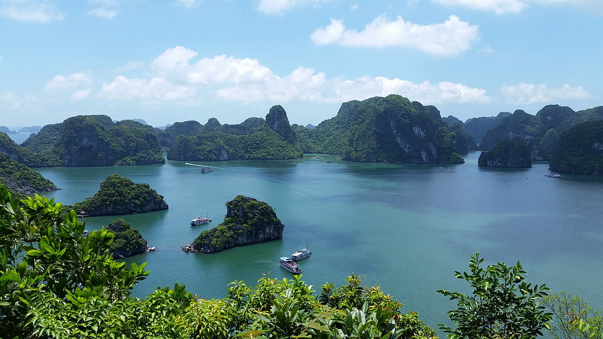 Halong Bay Vietnam Landscape With Limestone Karsts And Tour Boats