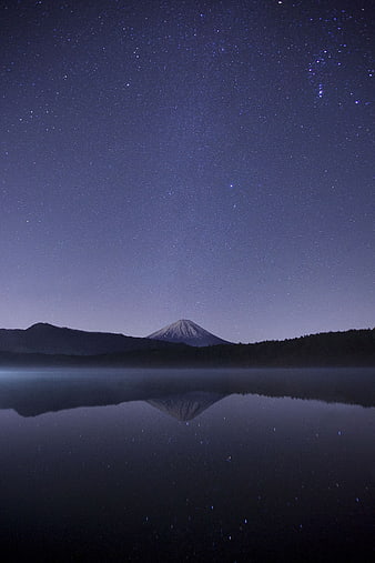 Starry Night Sky Over Mount Fuji Reflected in Lake