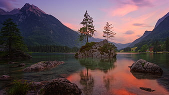 Alpine Lake Sunset With Rocky Island And Mountain Reflections