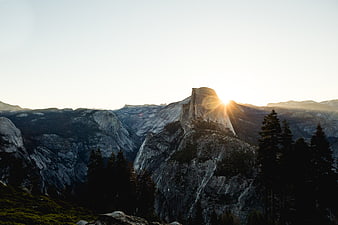 Sunset Behind Half Dome Mountain Peak in Yosemite National Park