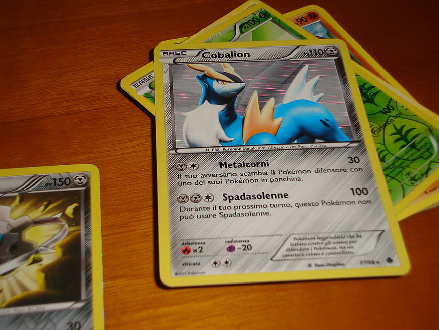 Italian Cobalion Pokemon Card on Wooden Table