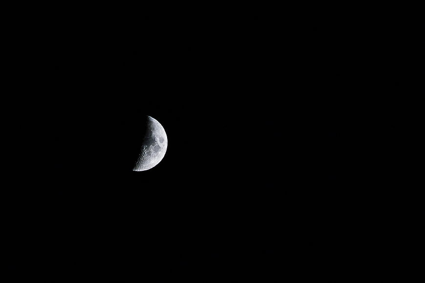 Crescent Moon in Dark Night Sky