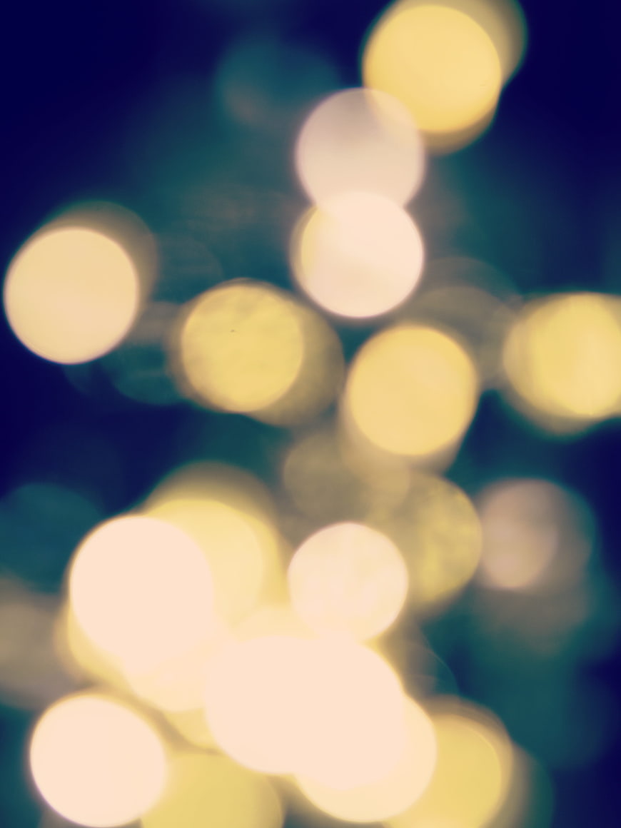 Abstract Bokeh Lights Background with Blue and Yellow Orbs