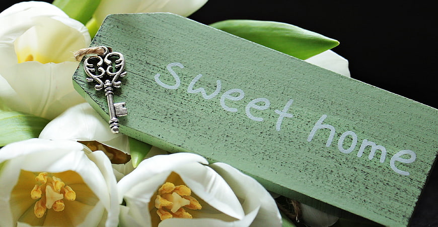 White tulips with vintage key and sweet home sign