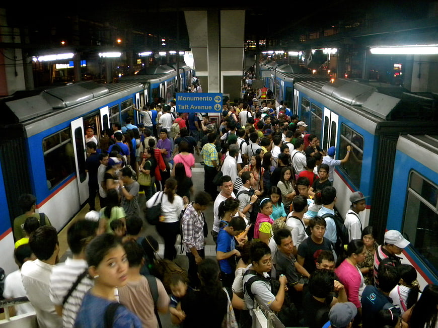 Crowded Metro Station Platform with Commuters