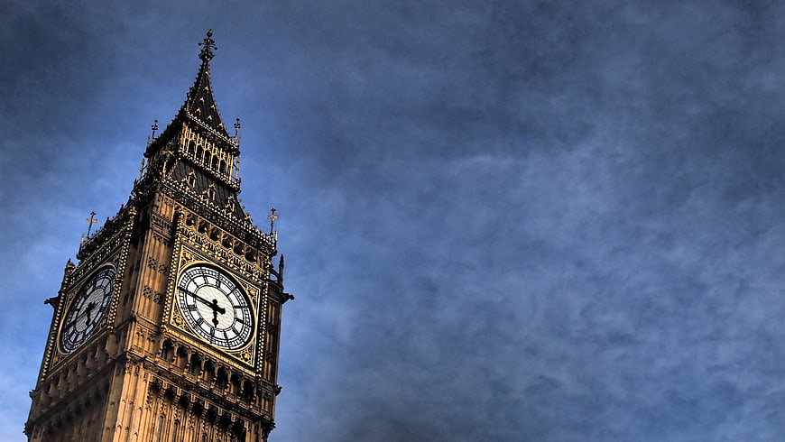Big Ben Clock Tower Against Dramatic Blue Sky