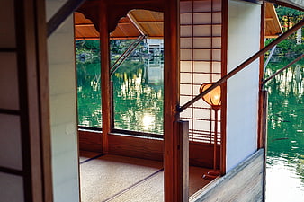 Traditional Japanese Tea House Interior with Pond View