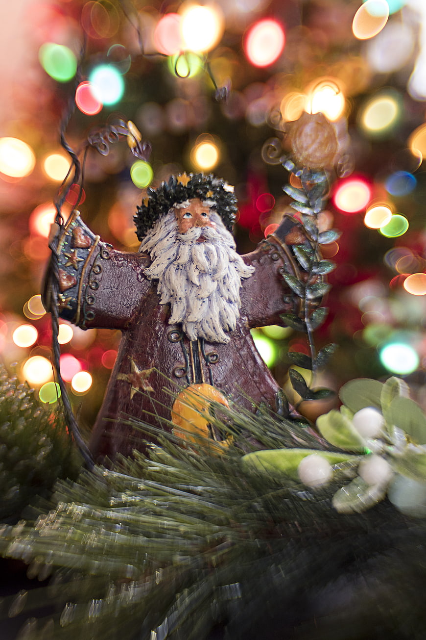 Vintage Santa Claus Ornament with Festive Bokeh Lights