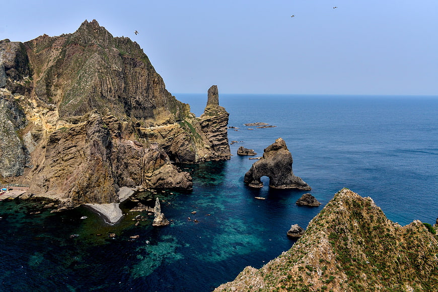 Dokdo Island Coastal Landscape With Sea Stacks And Clear Blue Water
