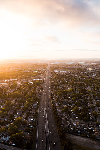 Aerial View of Highway at Golden Hour Sunset