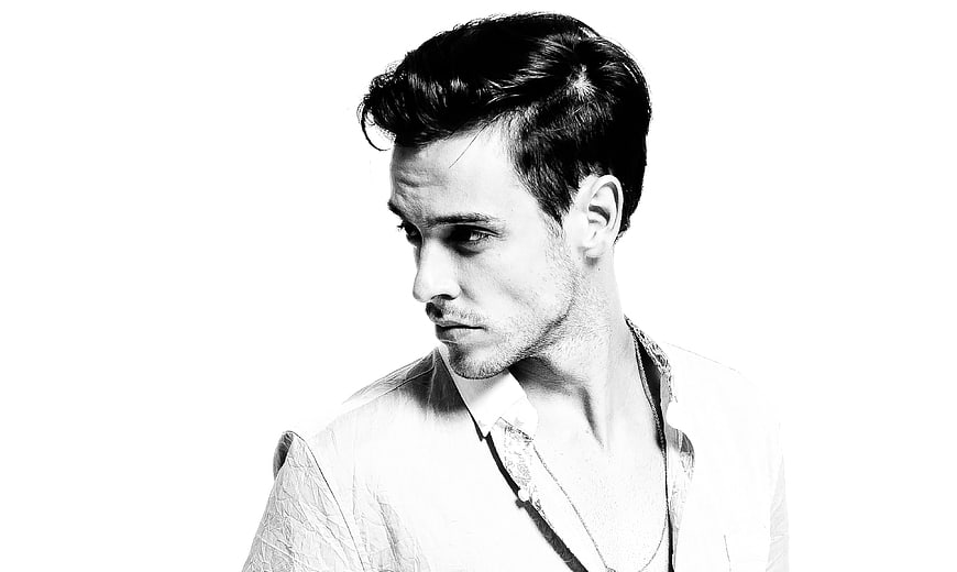 Black and White Portrait of a Young Man in a White Shirt