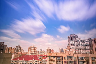 Urban cityscape with dramatic long exposure sky