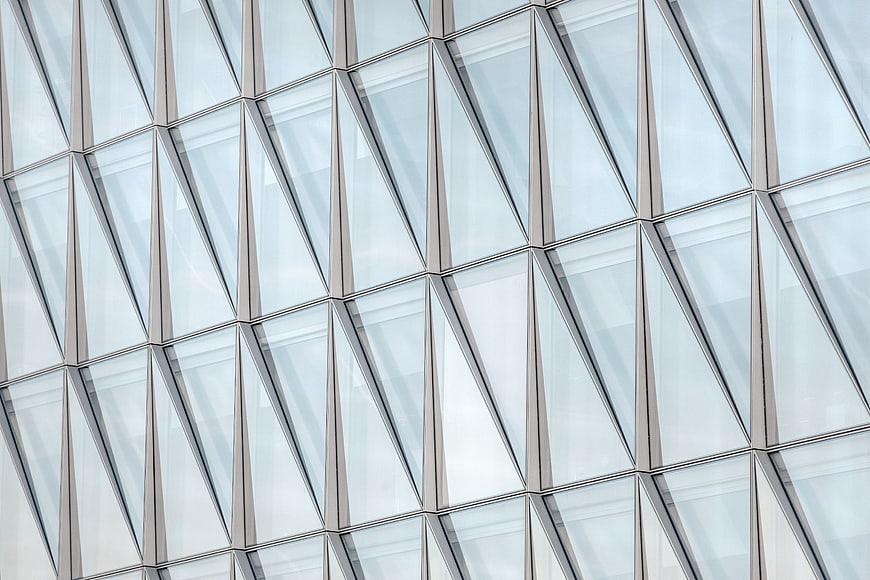 Modern geometric glass building facade pattern