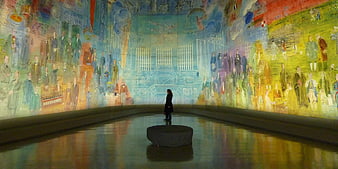 Woman Viewing Immersive Art Projection in Museum Gallery
