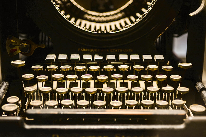 Close-up of vintage black typewriter keys and mechanism