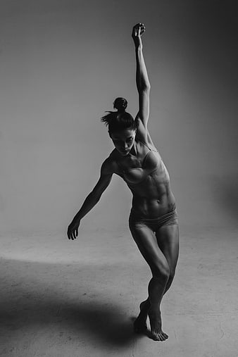 Black and white photo of a female dancer in motion