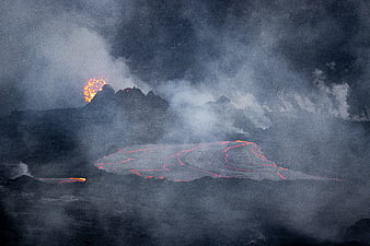 Dramatic Volcanic Eruption with Glowing Lava Flows and Smoke