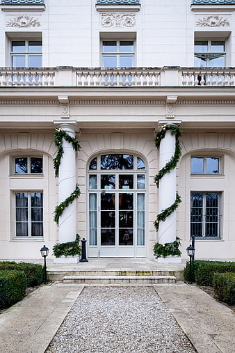 Luxury Mansion Entrance with Christmas Garland Decorations