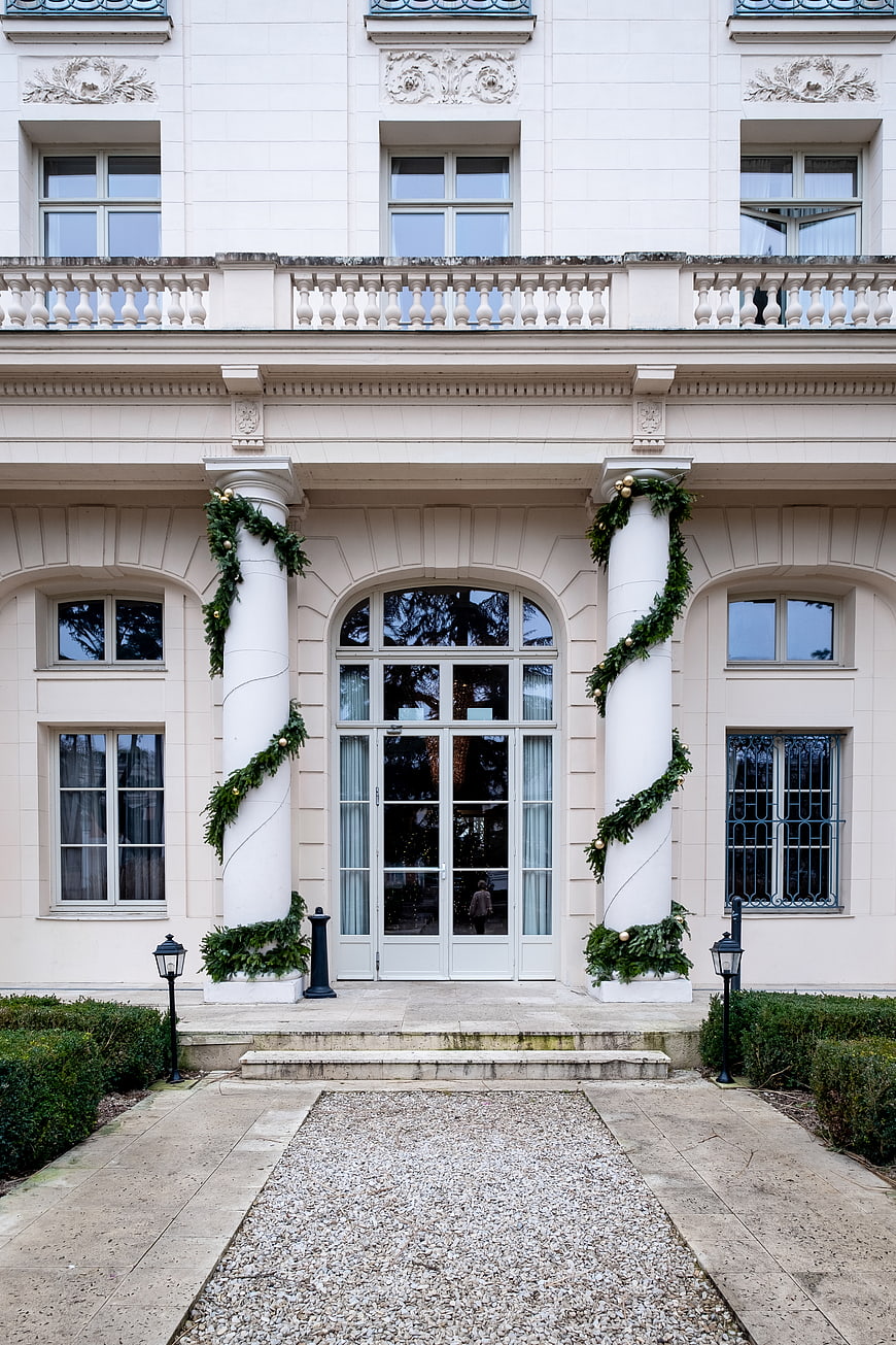 Luxury Mansion Entrance with Christmas Garland Decorations