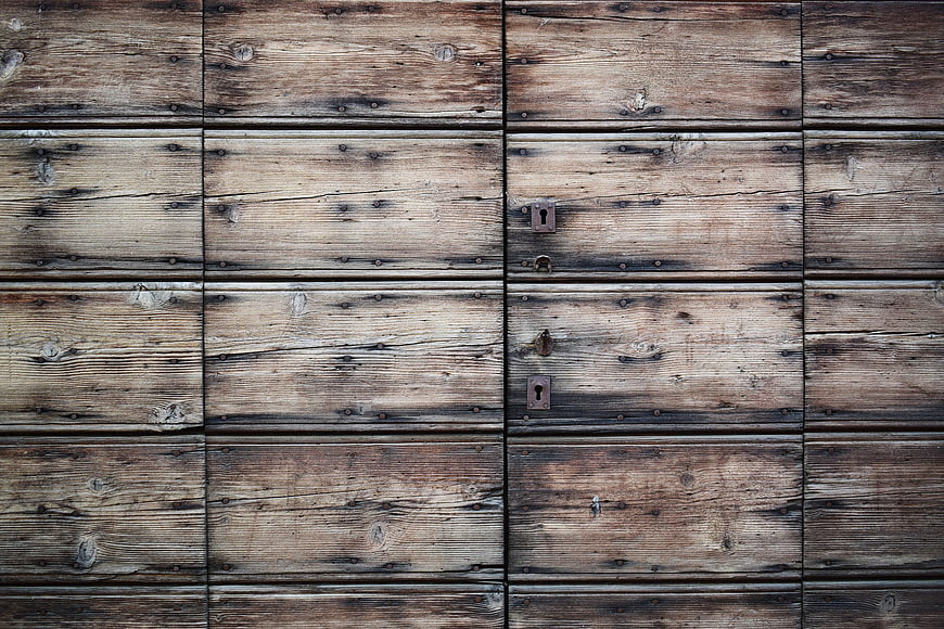 Vintage wooden chest with metal locks and rustic texture