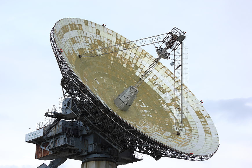 Large Soviet Radio Telescope Dish Antenna Against Overcast Sky