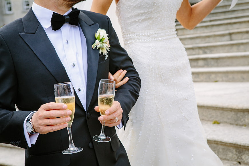 Bride and Groom Toasting with Champagne Glasses