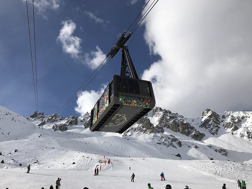 Gondola Lift Over Snowy Mountain Ski Slope
