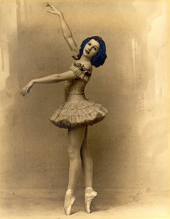 Vintage Hand-Tinted Portrait of a Ballerina in a Classical Ballet Pose