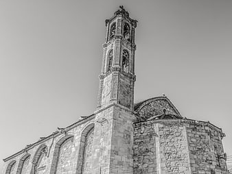 Black and white low angle view of historic Orthodox church tower