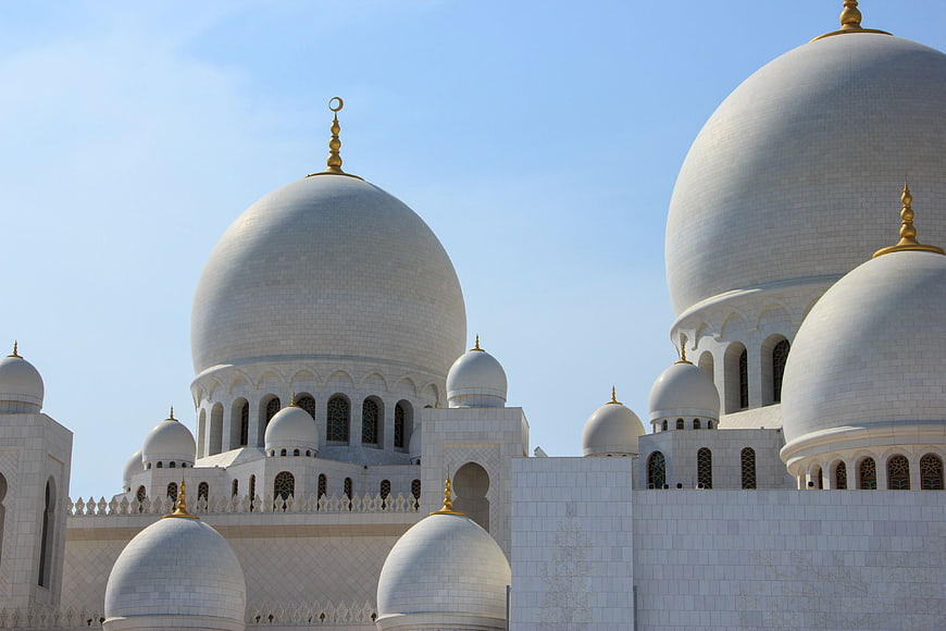 White Domes of Sheikh Zayed Grand Mosque in Abu Dhabi