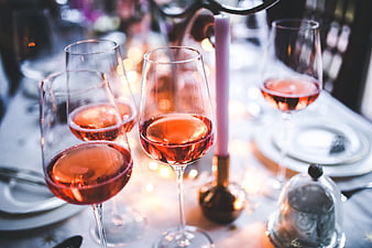 Elegant Rose Wine Glasses on Festive Table Setting
