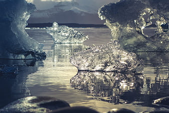 Crystal Clear Icebergs Floating in Glacial Lagoon Water