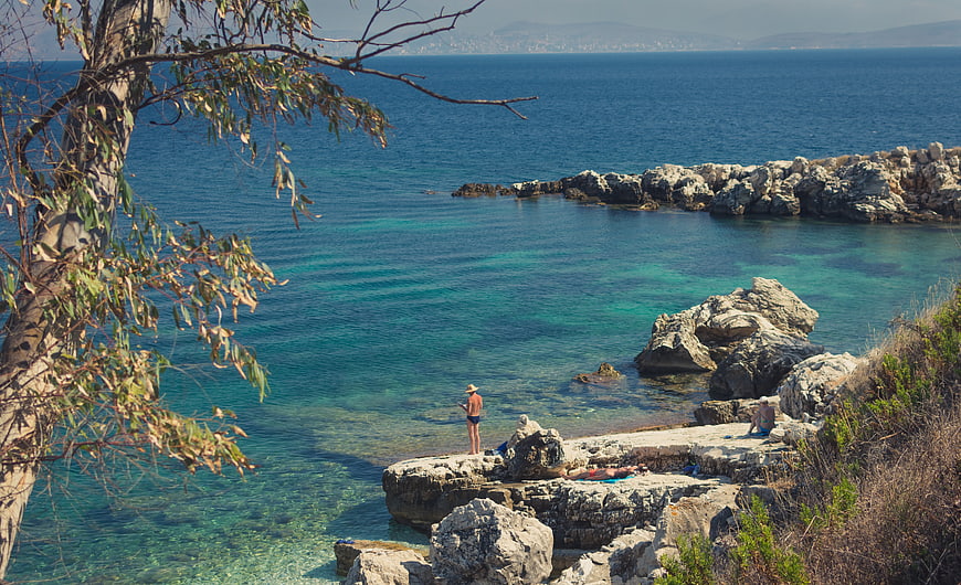 Scenic coastal view with turquoise water and rocky shore
