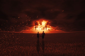 Silhouette of couple walking away from burning city skyline