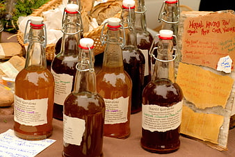 Starlit Gardens Organic Apple Cider Vinegar Bottles at Farmers Market
