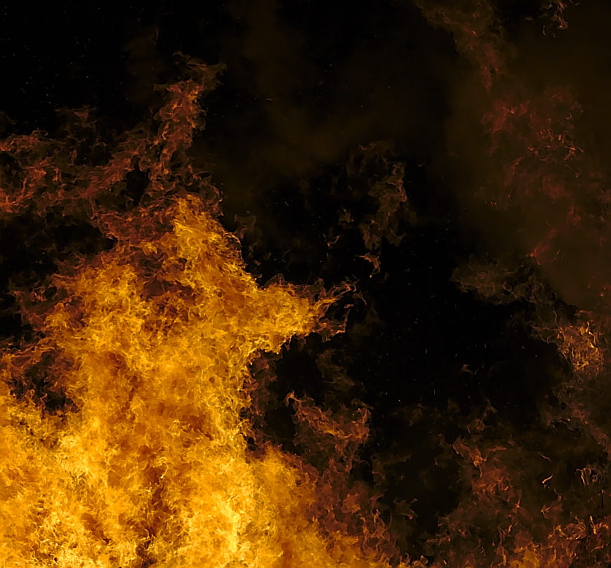Intense Orange Flames Burning Against Black Background