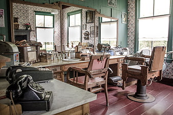 Vintage Barbershop Interior with Antique Chairs and Tools