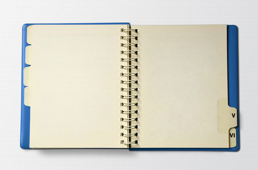 Open Blue Spiral Notebook With Blank Pages And Tabs