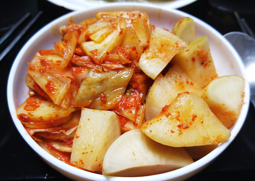 Bowl of spicy kimchi and radish side dish