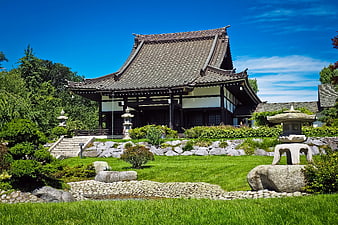 Traditional Japanese Temple in Lush Garden